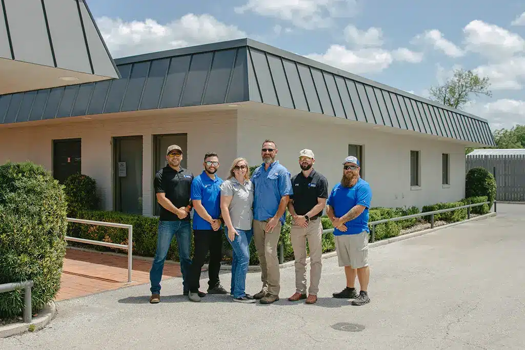 Photo of Superb Roofing & Restoration Team Standing by their new Braunfels landa street office location