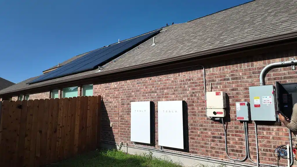 New roof with CertainTeed Landmark AR shingles and rooftop solar panels installed by Superb Roofing & Restoration at Sunset Cove in New Braunfels, TX 78130